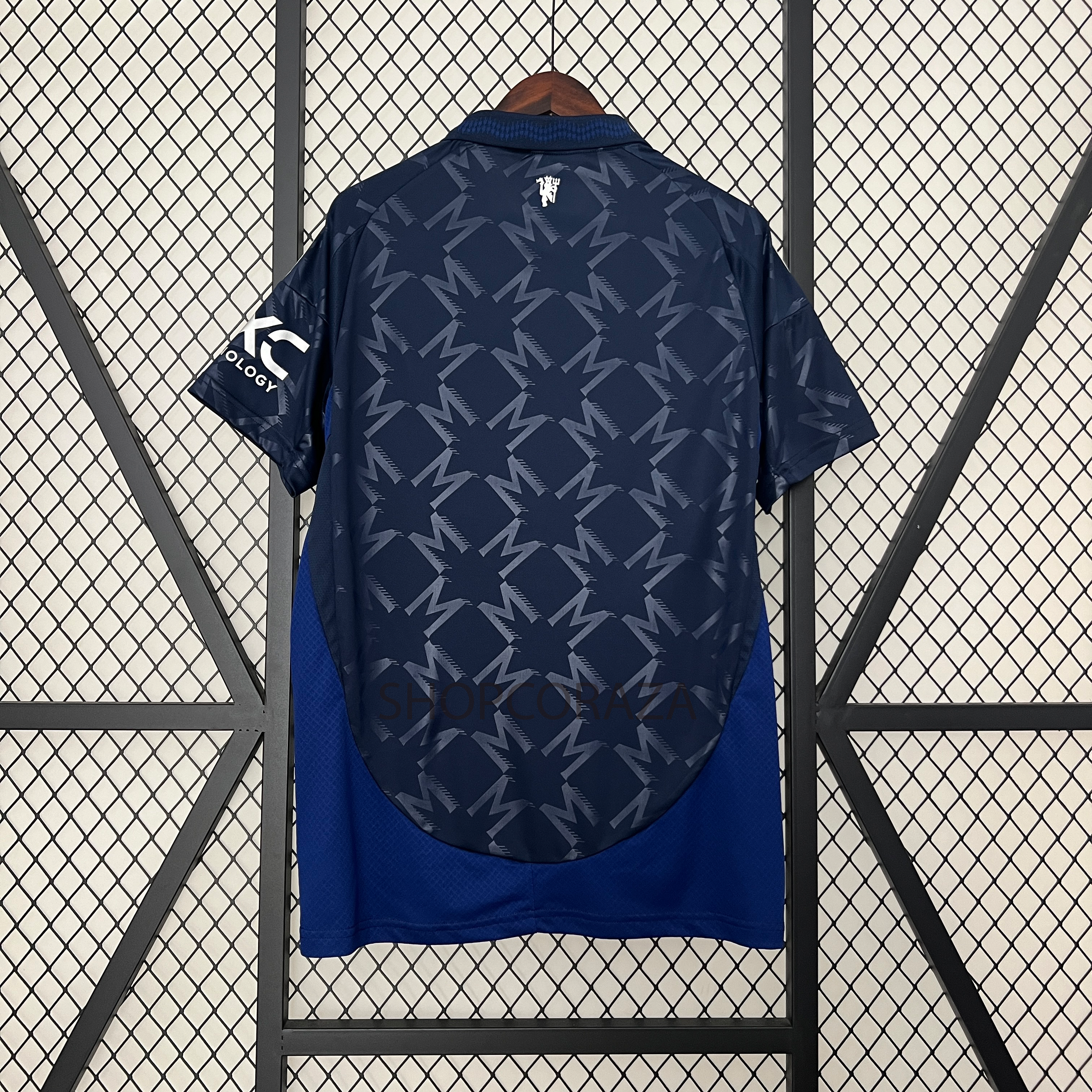 Manchester United Visitante L Azul cuello 24/25